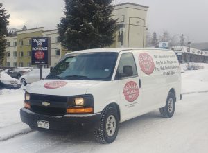 Delivery van in front of Beavers Sports Shop